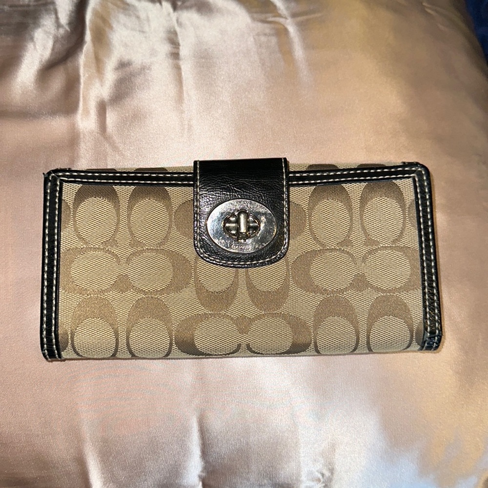 Coach Signature “C” bifold wallet.